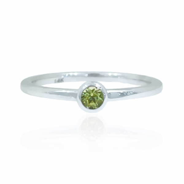 peridot .12ct dot ring